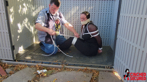 www.cinchedandsecured.com - 1472 - Minx Tied and Left in the Shed thumbnail